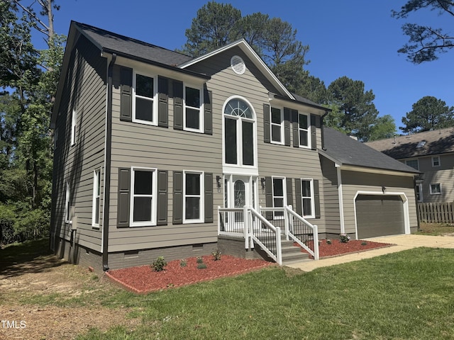 view of front of home with crawl space, an attached garage, a front lawn, and concrete driveway