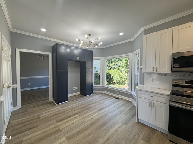 kitchen with stainless steel appliances, a chandelier, recessed lighting, ornamental molding, and light wood-style floors