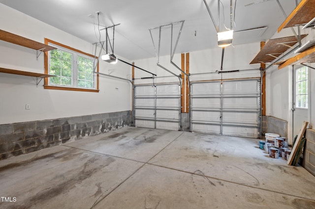 garage featuring a garage door opener