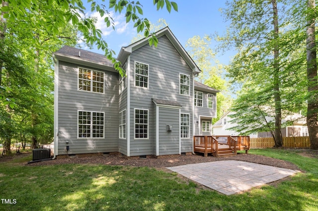 rear view of property with a patio, a deck, central air condition unit, and crawl space