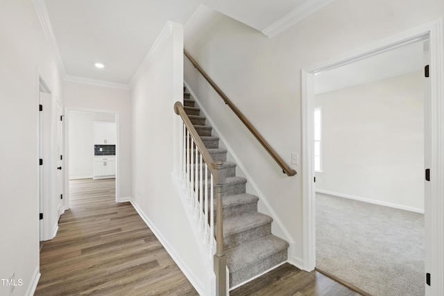 50 Rosewood Ln, Youngsville, NC 27596 - stairway with ornamental molding, baseboards, wood finished floors, and recessed lighting