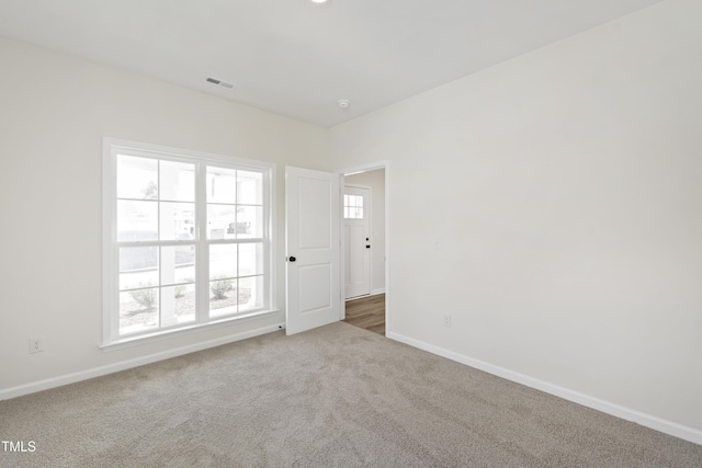 50 Rosewood Ln, Youngsville, NC 27596 - carpeted empty room featuring baseboards