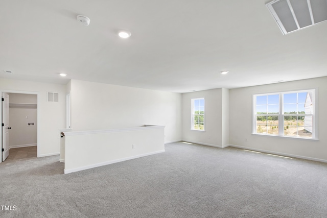 50 Rosewood Ln, Youngsville, NC 27596 - spare room with carpet flooring, baseboards, a smoke detector, and recessed lighting