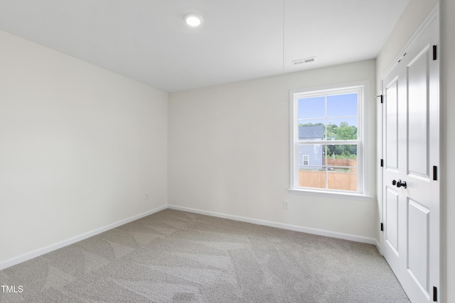 50 Rosewood Ln, Youngsville, NC 27596 - unfurnished bedroom with baseboards and carpet floors