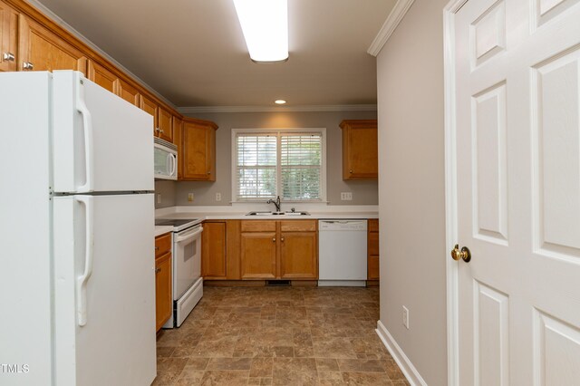 716 Lakeview Ave, Wake Forest, NC 27587 - kitchen with white appliances, a sink, stone finish floors, ornamental molding, and light countertops