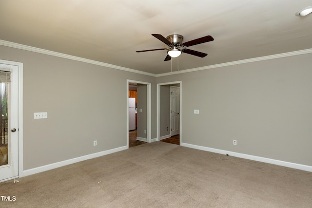 716 Lakeview Ave, Wake Forest, NC 27587 - unfurnished bedroom featuring freestanding refrigerator, ornamental molding, baseboards, carpet, and a ceiling fan