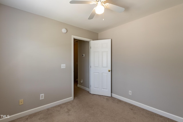 716 Lakeview Ave, Wake Forest, NC 27587 - empty room with baseboards, carpet, a smoke detector, and a ceiling fan