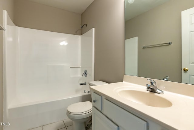 716 Lakeview Ave, Wake Forest, NC 27587 - bathroom featuring toilet, tile patterned flooring, vanity, and bathtub / shower combination