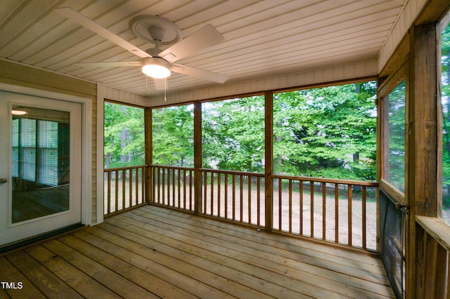 716 Lakeview Ave, Wake Forest, NC 27587 - unfurnished sunroom featuring a ceiling fan, a deck, wooden ceiling, and wood-type flooring
