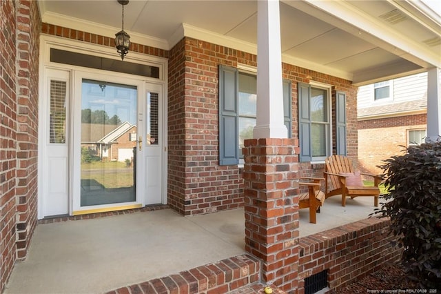 3024 Metthame Dr, Fayetteville, NC 28306 - view of exterior entry featuring covered porch and brick siding