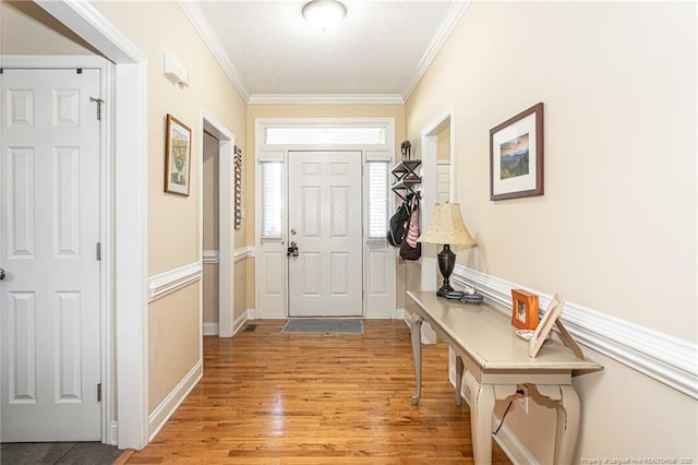 3024 Metthame Dr, Fayetteville, NC 28306 - entryway with light wood-style flooring, ornamental molding, and baseboards