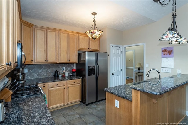 3024 Metthame Dr, Fayetteville, NC 28306 - kitchen with stainless steel fridge with ice dispenser, a sink, stove, backsplash, and black microwave