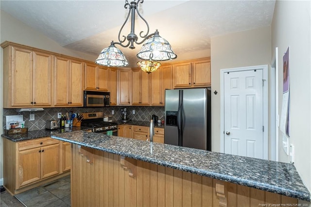 3024 Metthame Dr, Fayetteville, NC 28306 - kitchen featuring appliances with stainless steel finishes, decorative backsplash, dark stone counters, and pendant lighting