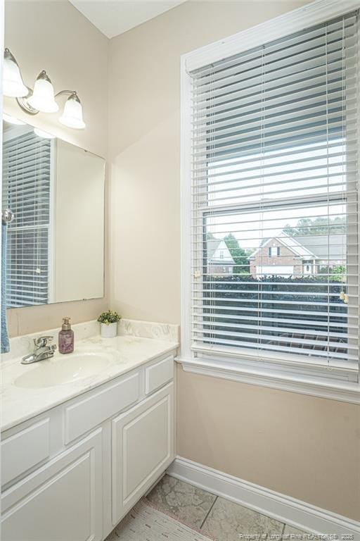 3024 Metthame Dr, Fayetteville, NC 28306 - bathroom featuring baseboards and vanity