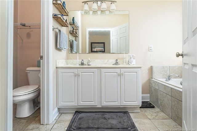 3024 Metthame Dr, Fayetteville, NC 28306 - full bath with toilet, double vanity, a garden tub, and baseboards