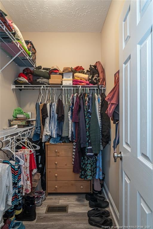 3024 Metthame Dr, Fayetteville, NC 28306 - walk in closet featuring wood finished floors