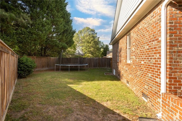 3024 Metthame Dr, Fayetteville, NC 28306 - view of yard with a trampoline