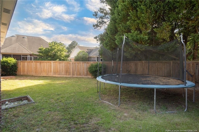 3024 Metthame Dr, Fayetteville, NC 28306 - view of yard with a trampoline
