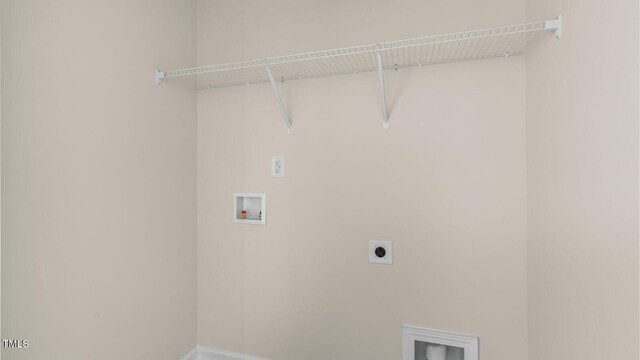 826 Old Tarboro Rd, Wendell, NC 27591 - washroom with electric dryer hookup, washer hookup, and baseboards