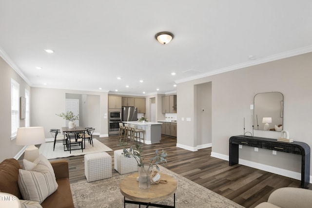 living room with ornamental molding, recessed lighting, dark wood-style flooring, and baseboards