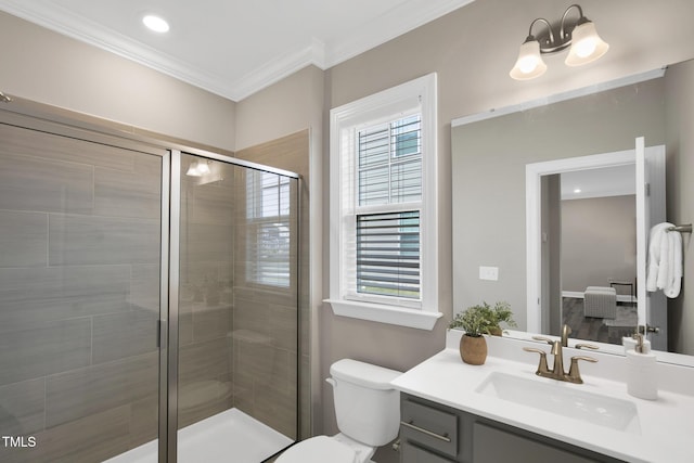 full bathroom featuring a shower stall, crown molding, vanity, toilet, and recessed lighting