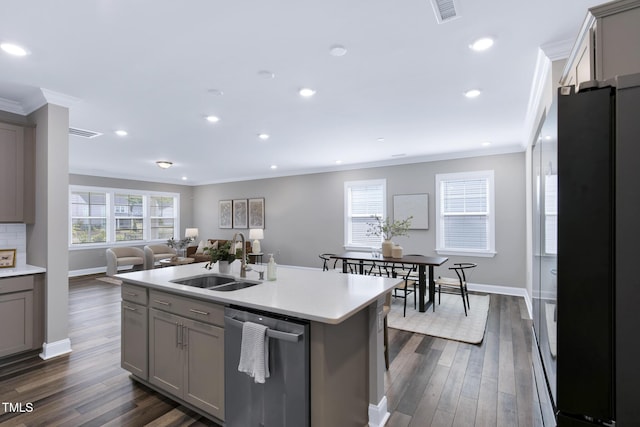 kitchen with a sink, dishwasher, gray cabinetry, ornamental molding, and freestanding refrigerator