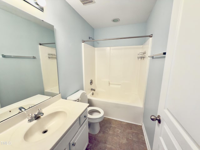 bathroom with toilet, washtub / shower combination, and vanity