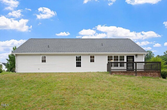 1969 Bowles Ave, Creedmoor, NC 27522 - rear view of house featuring a yard and a wooden deck