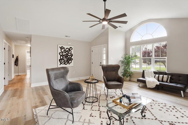 1969 Bowles Ave, Creedmoor, NC 27522 - living area with ceiling fan, light wood-style flooring, lofted ceiling, attic access, and baseboards