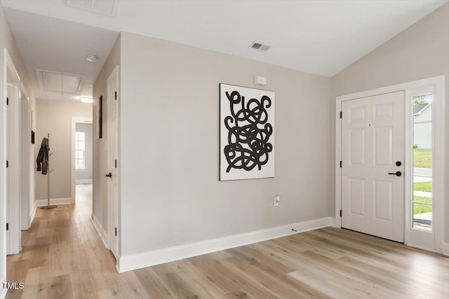 1969 Bowles Ave, Creedmoor, NC 27522 - entrance foyer featuring light wood-type flooring, healthy amount of natural light, baseboards, and lofted ceiling