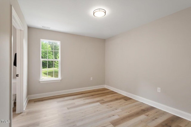 1969 Bowles Ave, Creedmoor, NC 27522 - spare room with light wood-style floors and baseboards