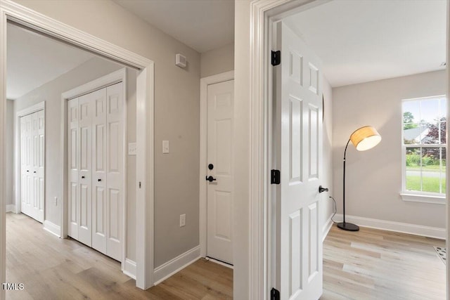 1969 Bowles Ave, Creedmoor, NC 27522 - corridor featuring light wood finished floors and baseboards