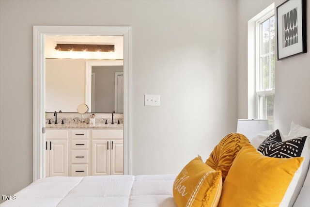 1969 Bowles Ave, Creedmoor, NC 27522 - bedroom featuring a sink and connected bathroom