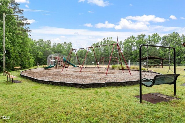 1969 Bowles Ave, Creedmoor, NC 27522 - community play area featuring a yard