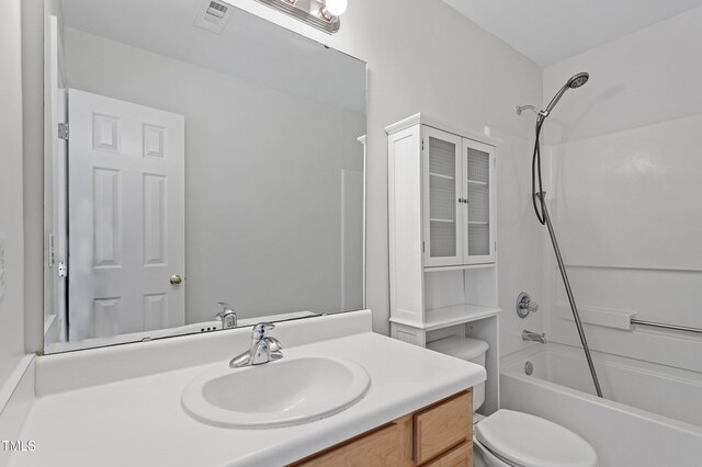 full bathroom featuring toilet, shower / bath combination, and vanity