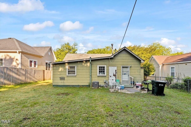 rear view of property featuring entry steps