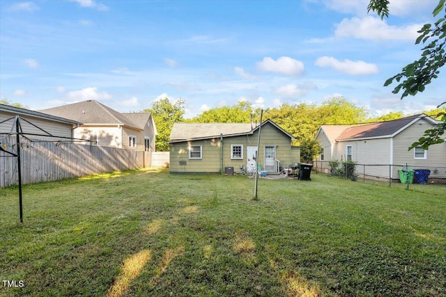 view of yard with central AC unit