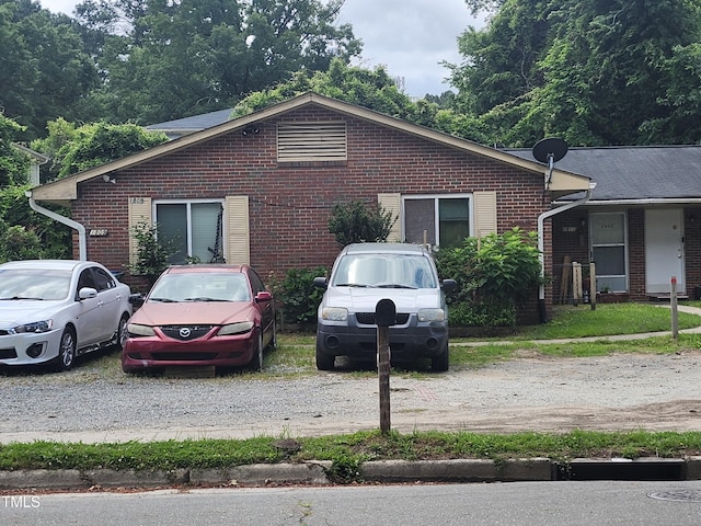 view of home's exterior with brick siding