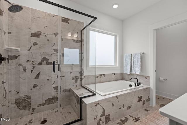 825 Abbyberry Dr, Wake Forest, NC 27587 - bathroom with a bath, a shower stall, recessed lighting, and baseboards