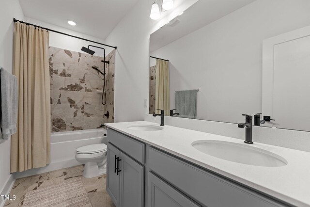 825 Abbyberry Dr, Wake Forest, NC 27587 - bathroom featuring double vanity, toilet, and shower / bath combo
