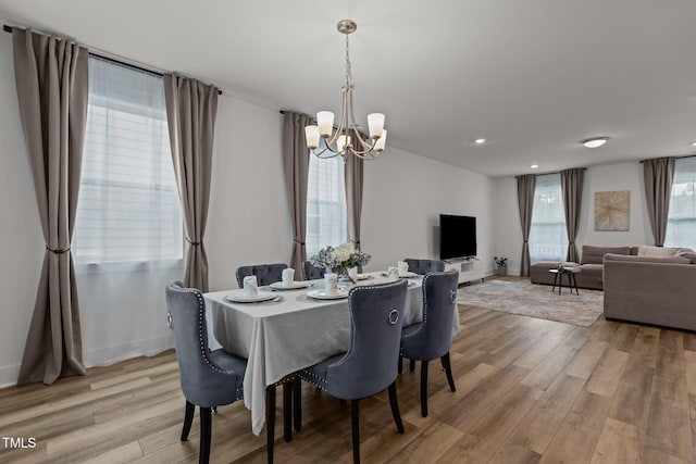 825 Abbyberry Dr, Wake Forest, NC 27587 - dining area with a chandelier, light wood-style floors, recessed lighting, and baseboards