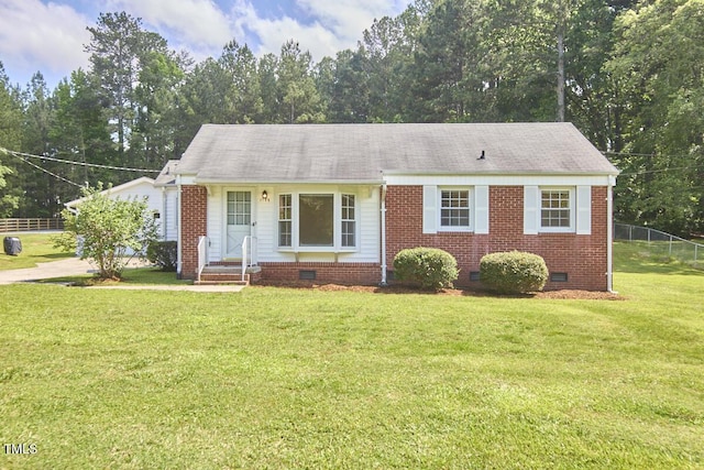 1105 Horseshoe Rd, Durham, NC 27703 - view of front facade featuring crawl space, brick siding, and a shingled roof