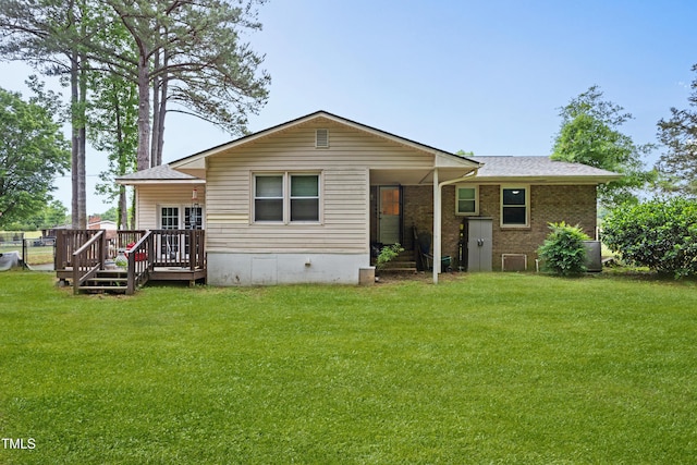 901 Currin Perry Rd, Zebulon, NC 27597 - rear view of house with a wooden deck, a yard, crawl space, and central AC unit