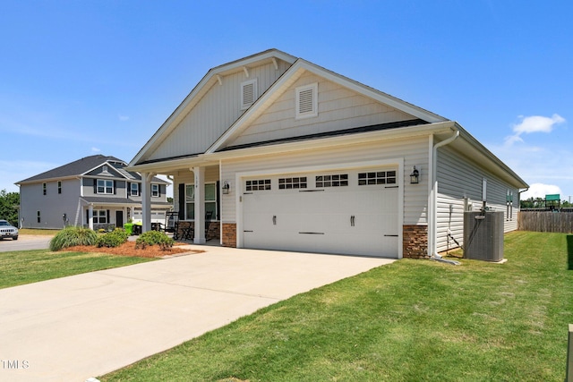 craftsman inspired home with central air condition unit, stone siding, concrete driveway, a garage, and a porch
