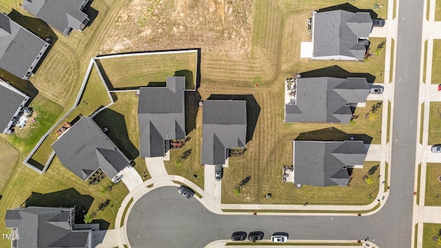 aerial view of property's location featuring nearby suburban area
