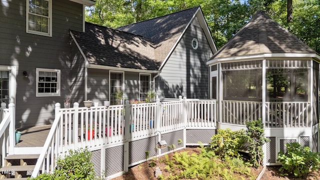 6517 Hidden Pond Rd, Wendell, NC 27591 - wooden deck with a sunroom