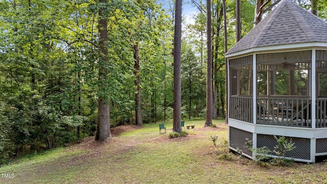 6517 Hidden Pond Rd, Wendell, NC 27591 - view of yard featuring a sunroom