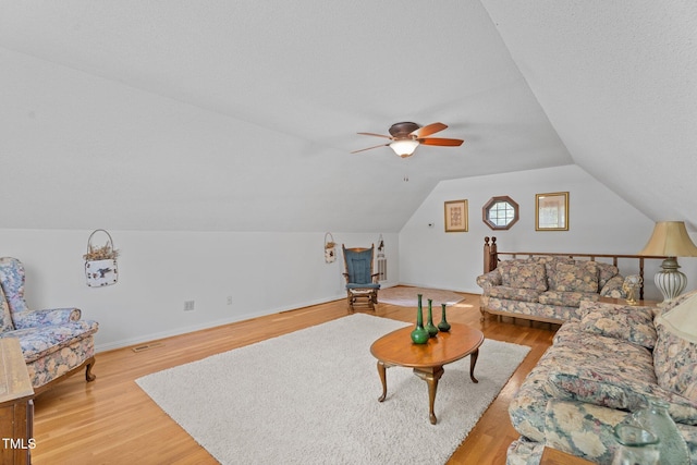 6517 Hidden Pond Rd, Wendell, NC 27591 - living area with ceiling fan, lofted ceiling, light wood-style flooring, and baseboards