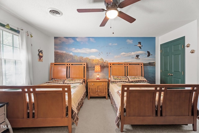 6517 Hidden Pond Rd, Wendell, NC 27591 - bedroom with light carpet, a textured ceiling, and a ceiling fan