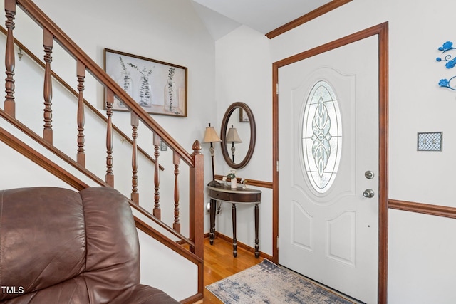 6517 Hidden Pond Rd, Wendell, NC 27591 - entryway featuring wood finished floors, stairs, and baseboards